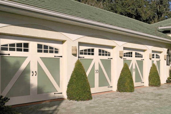 green painted wood garage doors
